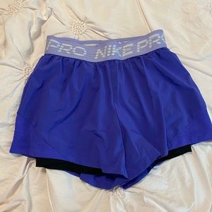 purple nike running shorts size small